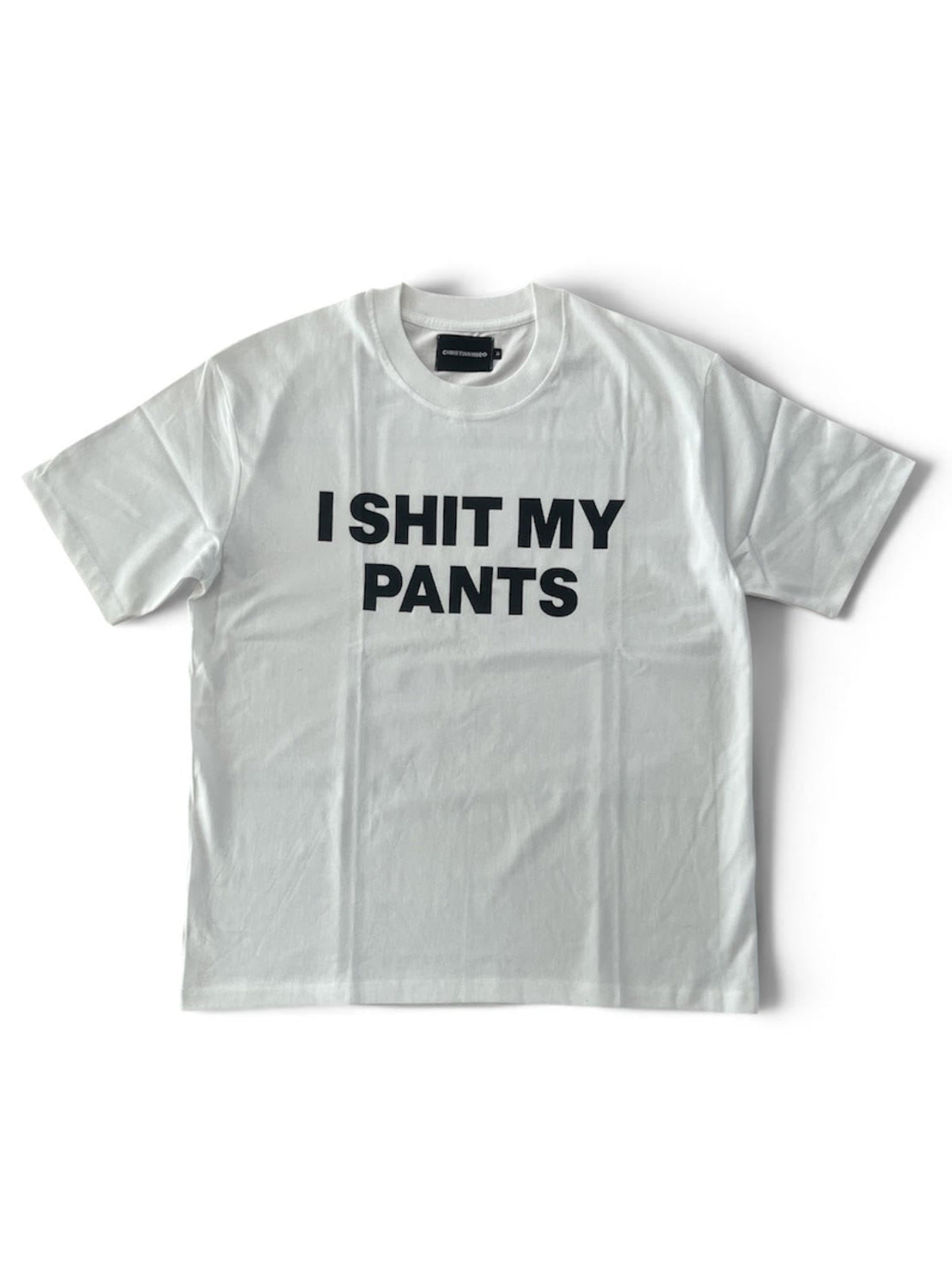 A white short-sleeve crewneck t-shirt with the text 'I SHIT MY PANTS' printed in bold black capital letters across the chest, displayed flat against a white background.